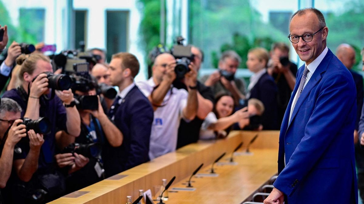 German Chancellor Friedrich Merz arrives for a press conference on home and foreign policy in Berlin on July 18, 2025. (Photo by John MACDOUGALL / AFP)